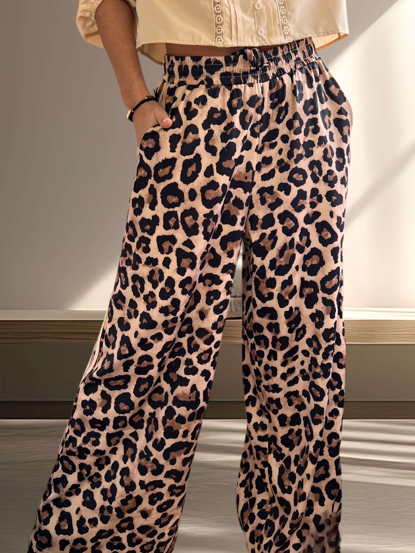 Pantalón palazzo animal print franjas