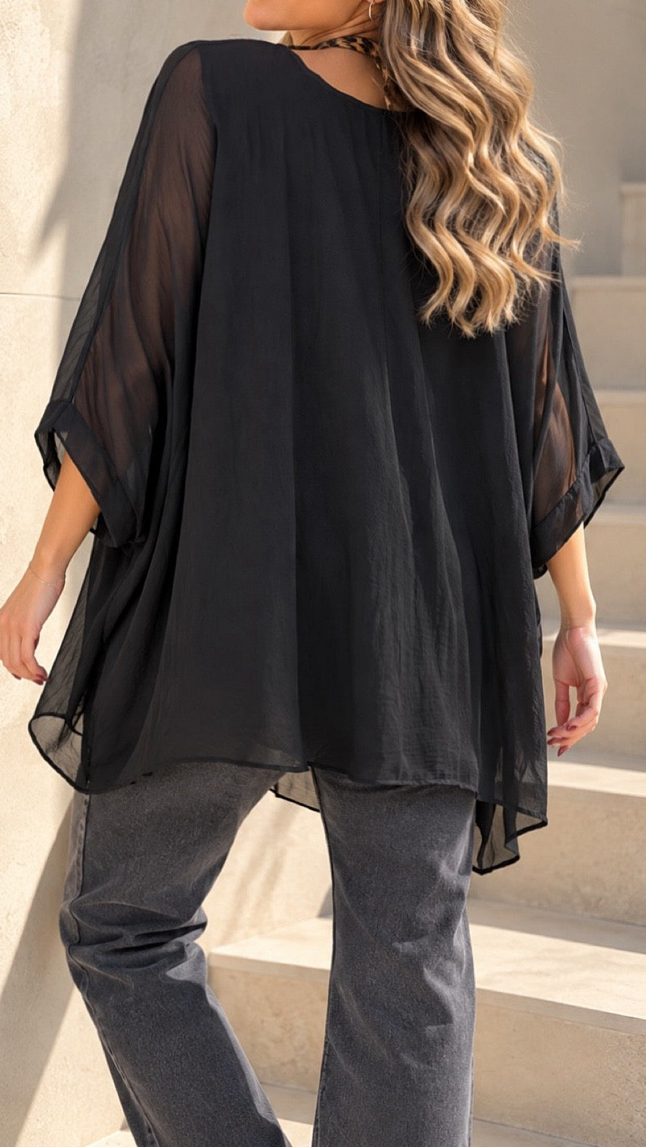 Blusa de gasa con brillo negra / Avance de Temporada