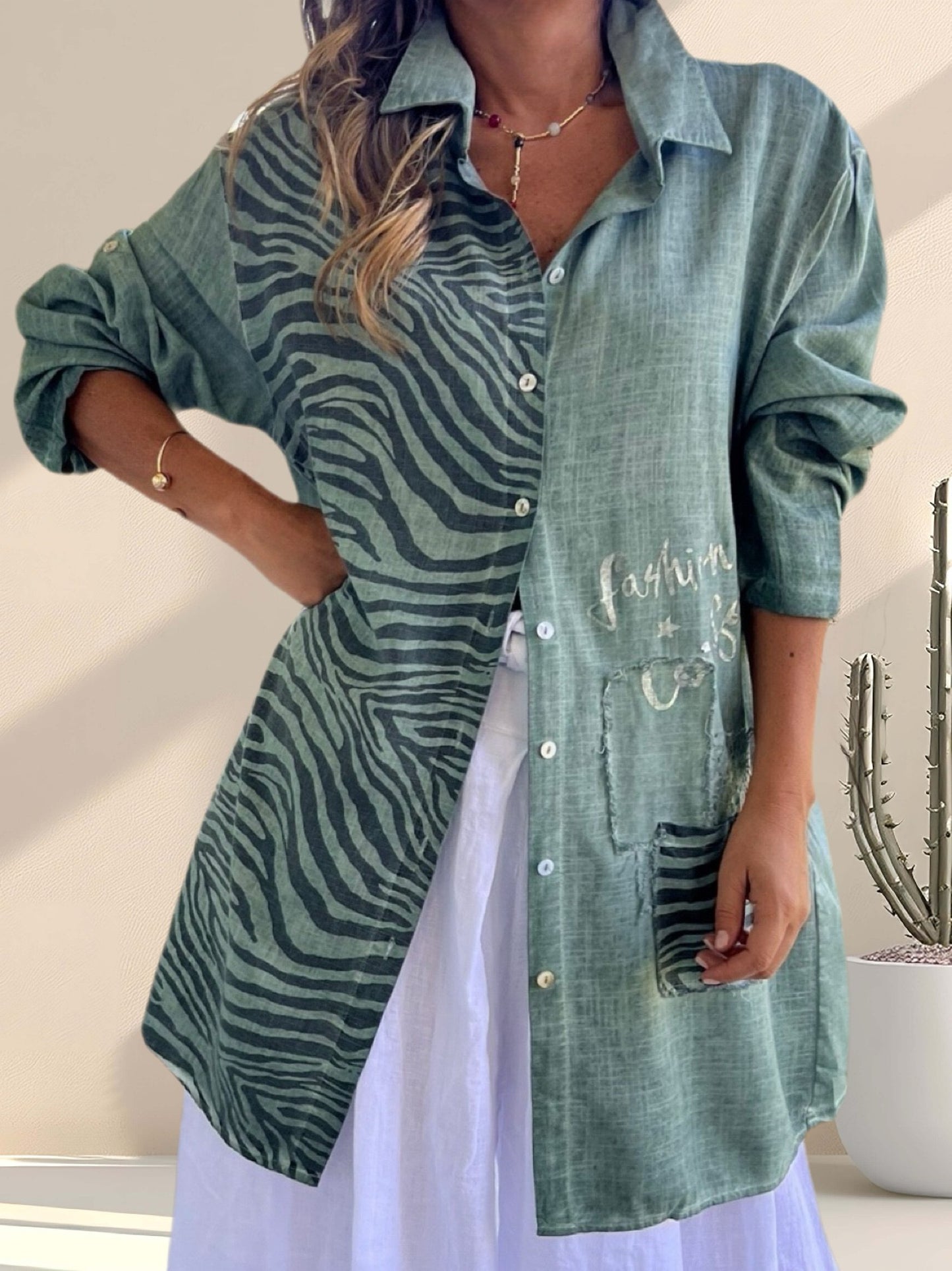 Blusa animal print con aplicaciones color verde