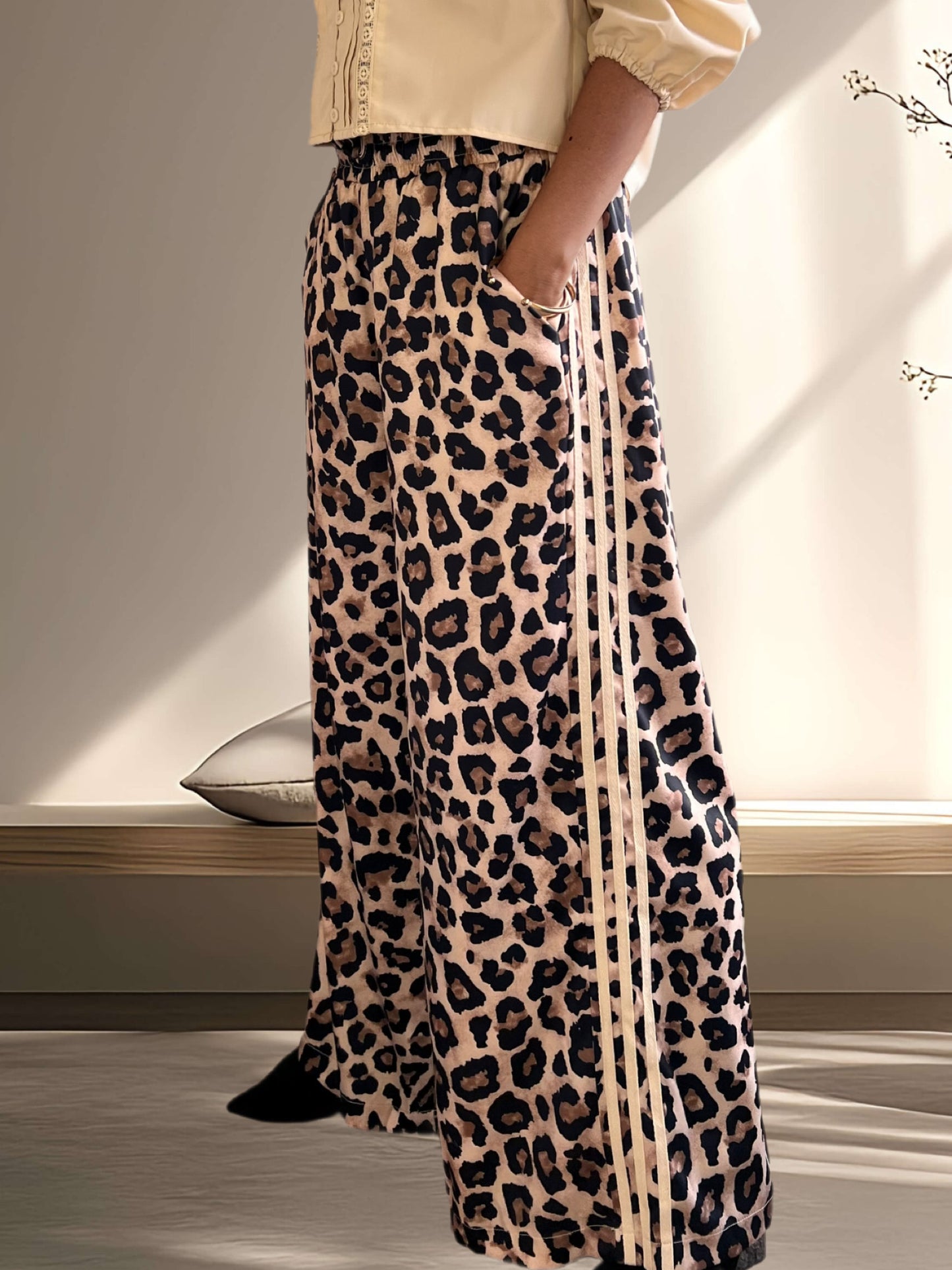 Pantalón palazzo animal print franjas