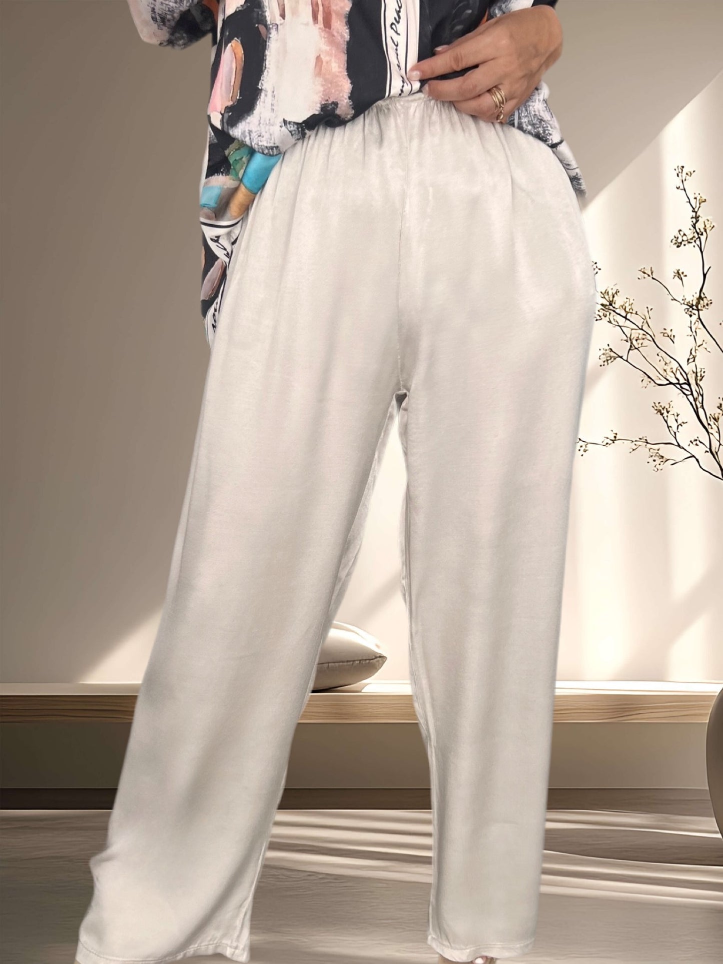 Pantalón satinado crema